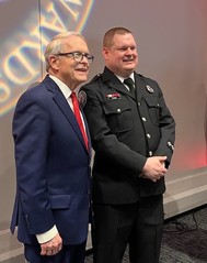 Governor DeWine pictured with a firefighter following the Hall of Fame induction ceremony held at COSI on Wednesday.