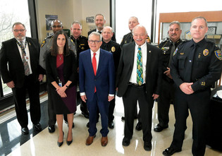 Governor DeWine poses alongside speakers for the NIBIN Announcement 