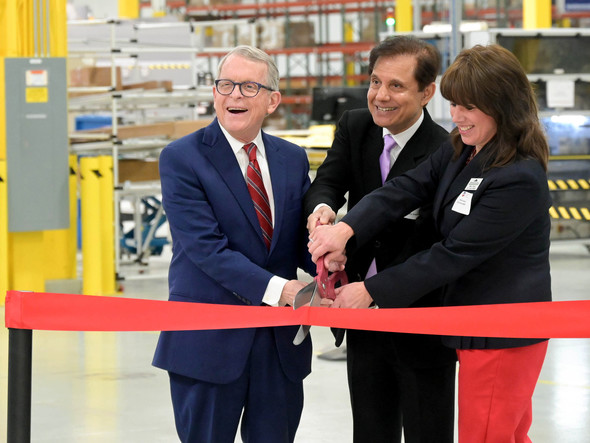 Governor DeWine cuts the ribbon at the relaunch celebration of American Battery Solutions' Ohio battery manufacturing facility.