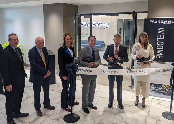 Lt. Governor Husted cuts the ribbon at the FlightSafety International Celebration, celebrating their new headquarters in Columbus.