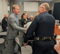 The Lt. Governor shakes hands with an officer at the Ohio State Highway Patrol Cleveland District Headquarters in Brook Park.