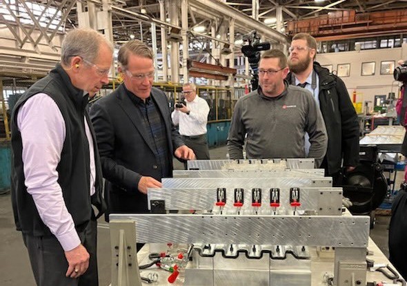 Lt. Governor learns how the machines operate during his tour.