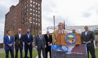 Governor DeWine at Canton's Centennial Plaza announcing state support for a new revitalization project.