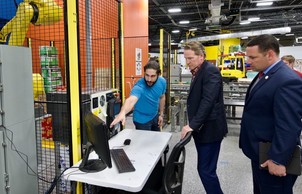 Lt. Governor learns about RōBEX's operations during a tour.