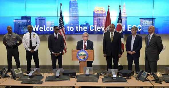 Governor Mike DeWine speaks at the Cleveland Police Department's Real Time Crime Center during his visit on Monday.