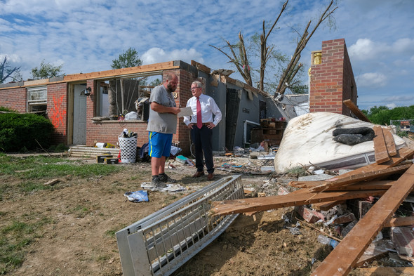 Governor DeWine speaks to a Goshen resident during his visit to see the aftermath of last week's summer storms and tornadoes.