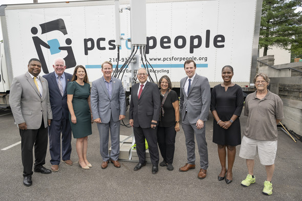 Lt. Governor poses with representatives from Cuyahoga County after announcing a new Broadband project.