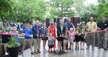 Governor DeWine, First Lady DeWine, and ODNR Director Mary Mertz cut the ribbon on the new play area at the Ohio State Fair.