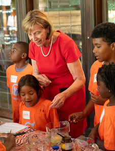 First Lady cooks pizza with children at residence