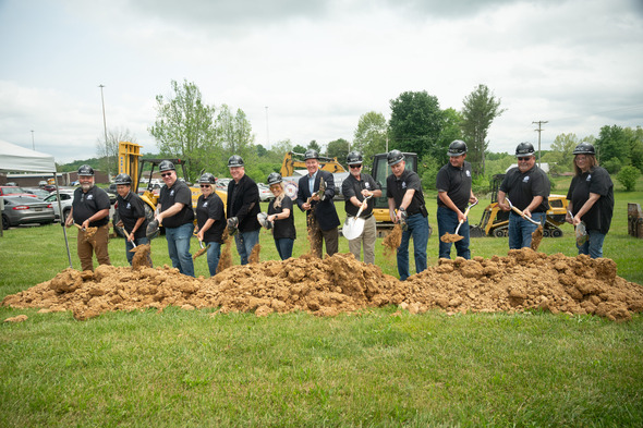 Husted with school leaders holding shovels breaking ground