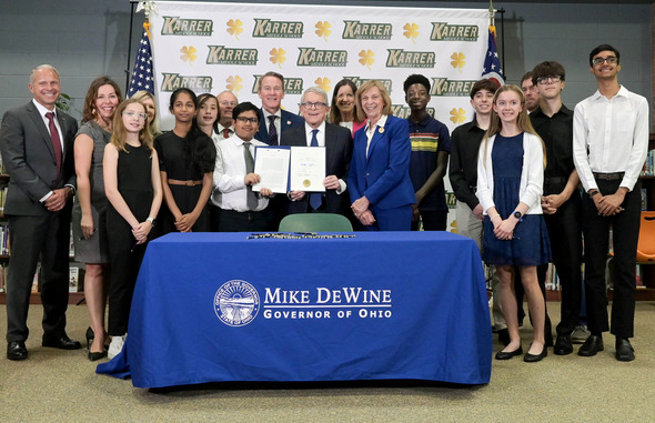 Governor DeWine signs HB 250 at Karrer Middle School in Dublin, Ohio