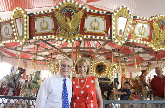 Governor and First Lady attend the unveiling of Young's Jersey Dairy's new carousel 