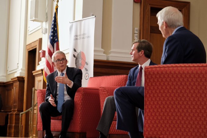 Governor DeWine speaking to Kentucky Governor Andy Beshear and Former United States Senator Rob Portman.