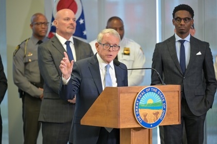 Photo of Governor DeWine at a podium during press conference in Cleveland