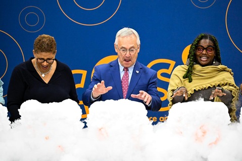 Lt. Governor Tressel participating in a COSI HIVE hands-on activity. 