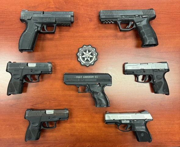 Image of seven illegally possessed guns seized by the Ohio Investigative Unit