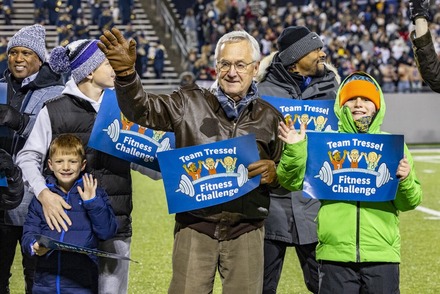 Lt. Governor Tressel waving at fans during the  The University of Akron vs. Kent State University football game.
