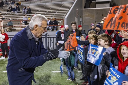 Lt. Governor Tressel talking to students at the Miami University football game. 
