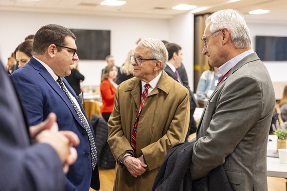 Governor DeWine and Lt. Governor Tressel speaking to a group of people.