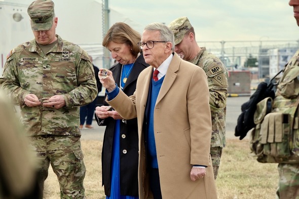 While visiting with the Ohio National Guard Governor DeWine presented eight members with a special challenge coin.