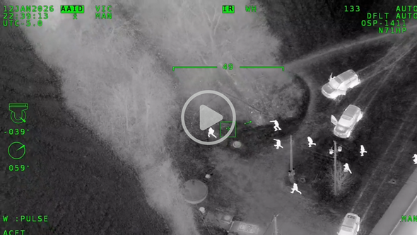 Aviation image of officers chasing a suspect