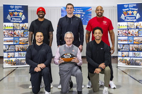 challenge captains posing with jim tressel