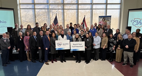 community partners standing in a group with lt. governor tressel