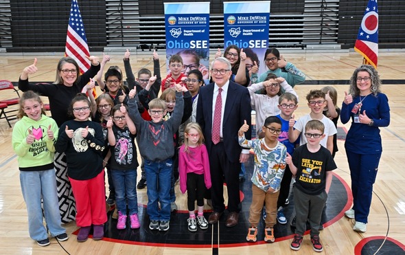 Governor DeWine posing with students at Spencerville Elementary School.