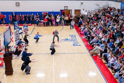 Lt. Governor Tressel doing squats with students from Zane Trace Local Schools. 