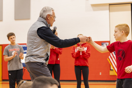 Lt. Governor Tressel fist bumping a student from London Middle School during a Team Tressel Fitness Challenge. 