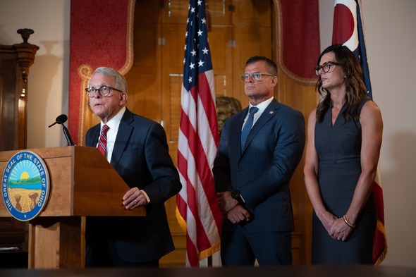 Governor DeWine speaking at a podium.