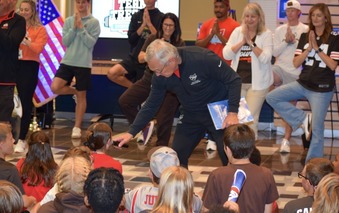 Lt. Governor Tressel speaking to a Willoughby-Eastlake student during a Team Tressel Fitness Challenge visit. 