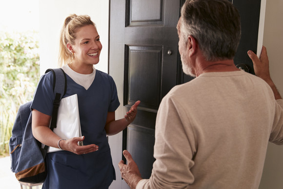 Home health nurse visiting a patient