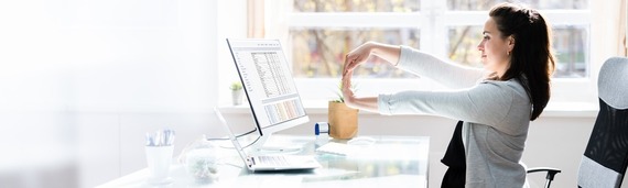 Hand stretching at a desk