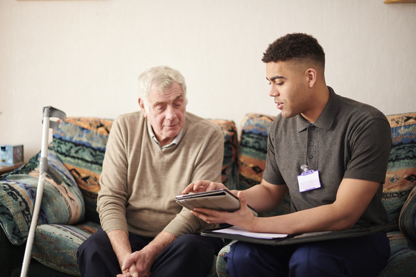 Caregiver helping a patient