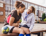 Coach and athlete talking