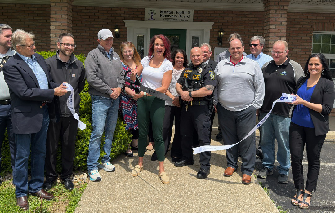Wayne Holmes ribbon cutting