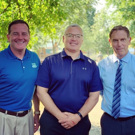 Pictured outdoors at DNR Park at the Ohio State Fair (trees in background): Kevin Miller, Shawn Henry, and Jeff Davis