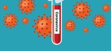 Graphic of  red test tube with word coronavirus and red coronavirus cell illustrations in the back ground