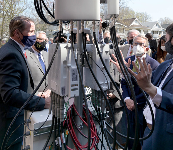 Governor DeWine and Lt. Governor Husted Look at the antenna that will provide broadband internet access to 2,000 homes