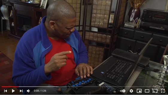 Man sitting at computer looking down
