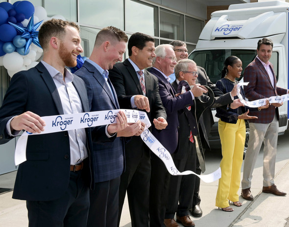 Governor DeWine helps cut the ribbon at the new Kroger Distribution Center