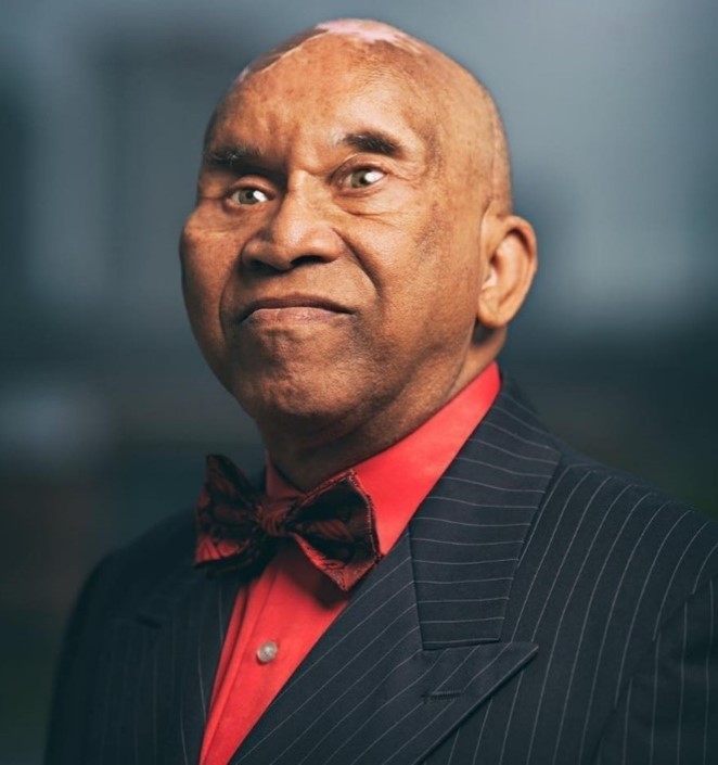 Head shot of African American gentleman wearing a bow tie