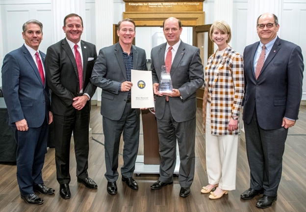 Photo of Jay Anderson, Director Kevin Miller, Lt. Governor Jon Husted, Jeff Risinger, Dr. Kristina Johnson, and Dr. Andrew Thomas