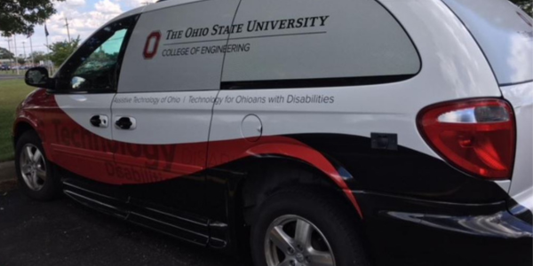 Assistive Technology of Ohio demonstration van parked in a lot.