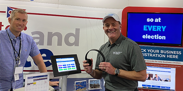 Kenny Henning with Director Miller at the 2024 Ohio State Fair Ohio Secretary of State's booth.