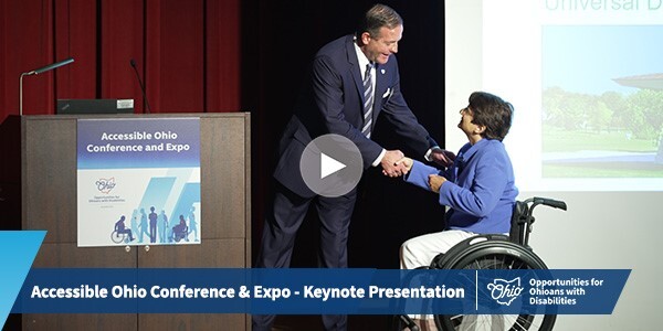 Director Miller shakes hands with Dr. Rosemarie Rossetti at the Accessible Ohio Conference & Expo.