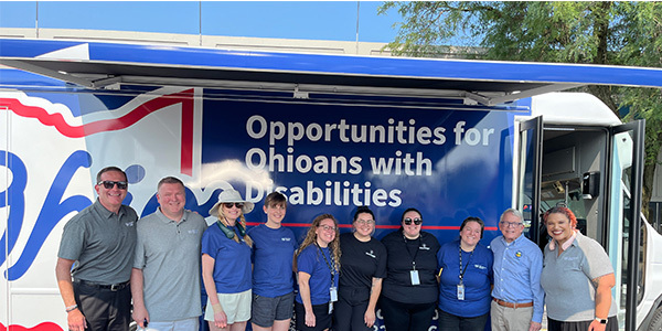 Governor DeWine and OOD Staff with Mobile Services Unit at the Ohio State Fair.