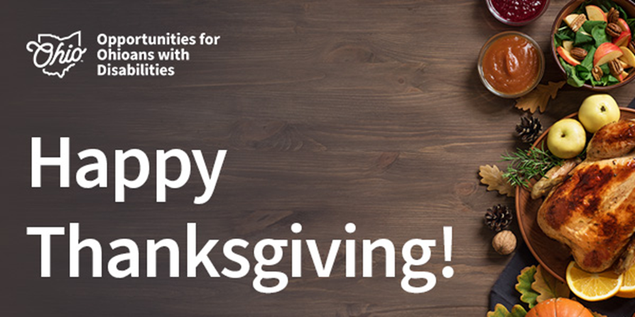 Traditional Thanksgiving meal. Text: Happy Thanksgiving!