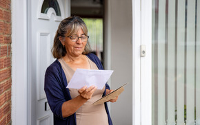 Woman reviewing mail